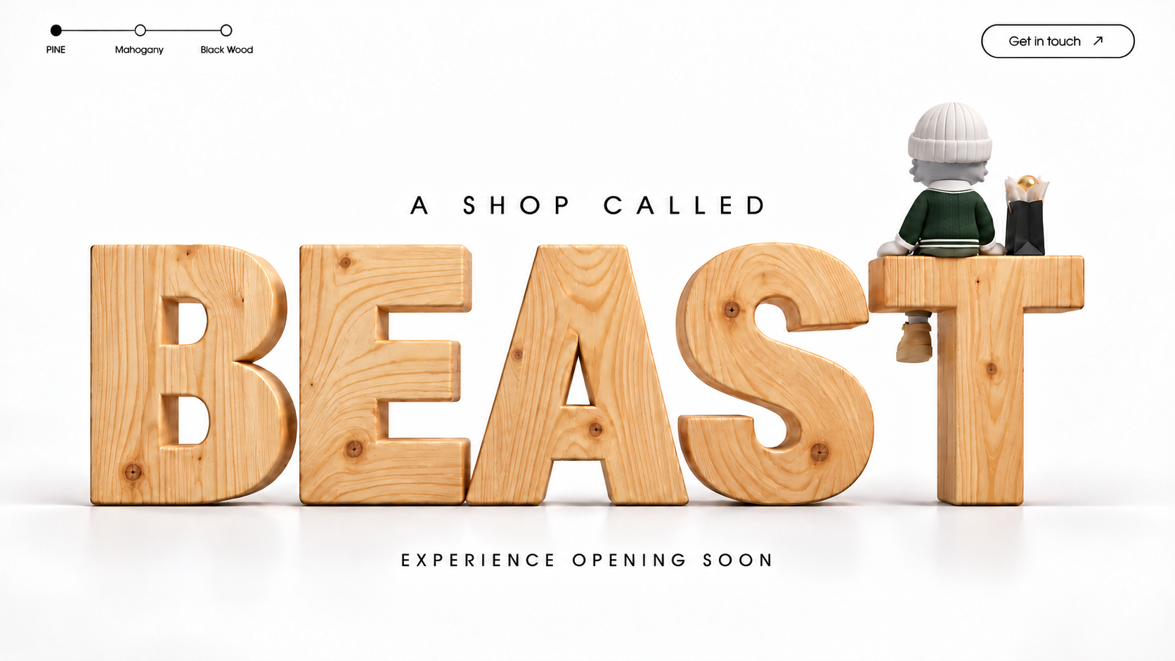 A SHOP CALLED BEAST. Oversized pine wood letters, with a seated knit character and shopping bag on the T. Experience opening soon.